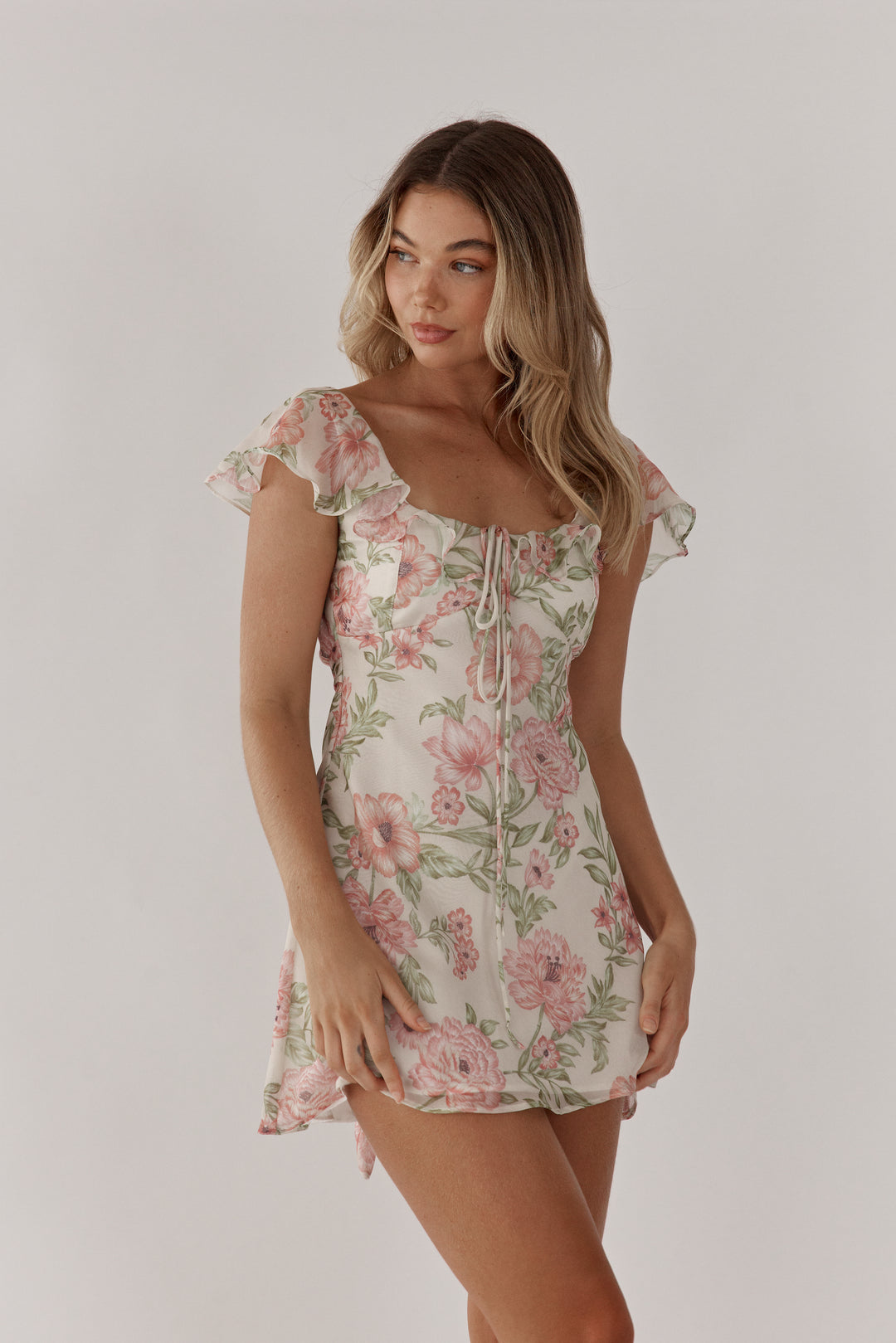 Silk floral mini dress perfect for romantic travels through europe