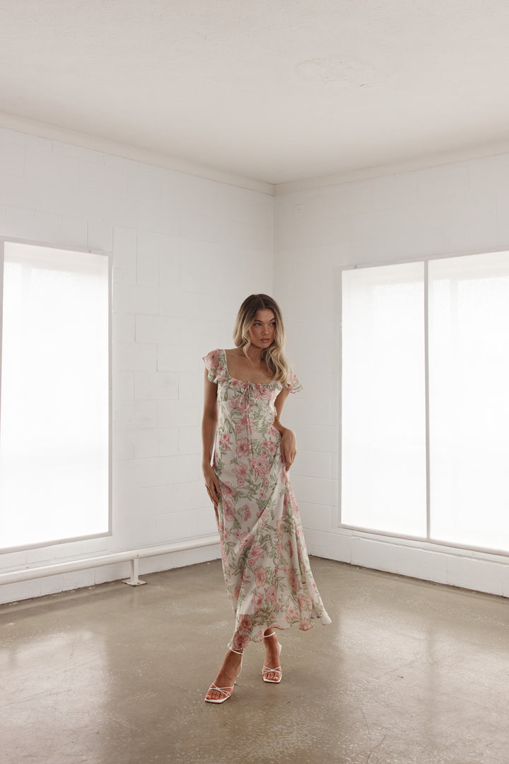 Maxi dress in floral silk fabric with frill sleeves and tie up front