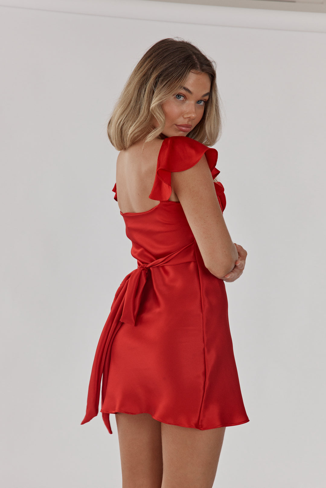 Red silk mini dress with tie up back and semi a-line skirt